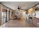 Bright living space with dining table and bar area, perfect for entertaining and relaxed living at 5808 W Acoma Dr, Glendale, AZ 85306