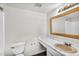 Bathroom featuring a faux marble countertop and modern fixtures at 6313 W Carol Ave, Glendale, AZ 85302