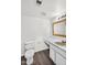 Bathroom featuring a faux marble countertop and modern fixtures at 6313 W Carol Ave, Glendale, AZ 85302