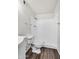 Bright bathroom features a white toilet and shower at 6313 W Carol Ave, Glendale, AZ 85302