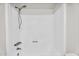 Clean white bathtub features showerhead at 6313 W Carol Ave, Glendale, AZ 85302
