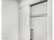 Walk-in closet features built-in shelving and rod for organized storage at 6313 W Carol Ave, Glendale, AZ 85302