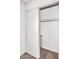Walk-in closet boasts built-in shelving and rod for organized storage solutions at 6313 W Carol Ave, Glendale, AZ 85302