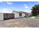 View of the front of the house showcasing a low maintenance yard and privacy wall at 6313 W Carol Ave, Glendale, AZ 85302