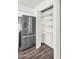Open pantry features abundant shelving, offering great storage solutions in the kitchen at 6313 W Carol Ave, Glendale, AZ 85302