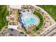 A bird's eye view showcases the community pool, a recreation center, a playground, and walking trails at 8426 W Solano Dr, Glendale, AZ 85305