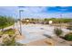 Outdoor basketball court in a community park, landscaped with trees and shrubbery, perfect for recreational play at 8426 W Solano Dr, Glendale, AZ 85305