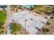 Aerial view of a community basketball court with manicured landscaping, nearby seating, and walking paths at 8426 W Solano Dr, Glendale, AZ 85305