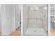 Bright, modern bathroom features a glass-enclosed shower and sleek fixtures at 8426 W Solano Dr, Glendale, AZ 85305