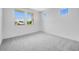 Inviting bedroom with carpet flooring, neutral paint and many windows at 8426 W Solano Dr, Glendale, AZ 85305