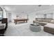Spacious game room with a pool table, comfortable seating, and neutral tones at 8426 W Solano Dr, Glendale, AZ 85305
