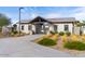 The recreation center features an open air entrance and is surrounded by native grasses and decomposed granite at 8426 W Solano Dr, Glendale, AZ 85305