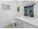 Elegant bathroom featuring a modern vanity, framed mirror, and natural lighting at 8935 N 82Nd St, Scottsdale, AZ 85258