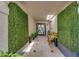Inviting foyer featuring tiled floors, green walls, a skylight, and a seating area at 8935 N 82Nd St, Scottsdale, AZ 85258