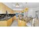 Kitchen features modern stainless steel appliances, granite countertops, and wood cabinets at 8935 N 82Nd St, Scottsdale, AZ 85258