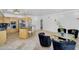 Bright, open kitchen with barstool seating, stainless steel appliances, and modern lighting at 8935 N 82Nd St, Scottsdale, AZ 85258