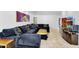 Spacious living room featuring a comfortable couch and tiled flooring at 8935 N 82Nd St, Scottsdale, AZ 85258