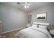 Cozy bedroom featuring bright natural light and bed at 9041 W Redbird Rd, Peoria, AZ 85383