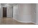 Neutral hallway showcases tile floors and decorative wall design at 9041 W Redbird Rd, Peoria, AZ 85383