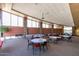 Spacious meeting room with large windows, providing a bright and inviting space for gatherings, events, and activities at 9041 W Redbird Rd, Peoria, AZ 85383