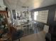 Dining area featuring elegant built-in cabinetry and a large window at 9501 E Broadway Rd # 21, Mesa, AZ 85208