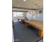 A billiards room with two pool tables covered in brown canvas and neutral grey paint at 9501 E Broadway Rd # 21, Mesa, AZ 85208