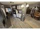 Well-organized kitchen with stainless steel appliances and ample cabinet space, adjacent to the dining area at 9501 E Broadway Rd # 21, Mesa, AZ 85208