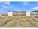 Radiance community sign with monument in front of desert landscaping under a blue sky at 10004 S Smythe Dr, Apache Junction, AZ 85120
