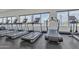 Modern gym with treadmills and windows provides a bright workout space for residents at 10004 S Smythe Dr, Apache Junction, AZ 85120