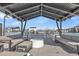Community lounge area with comfortable seating and a view of the pool at 10004 S Smythe Dr, Apache Junction, AZ 85120