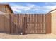 Wood fence providing privacy with a stone at 1002 W Villa Rita Dr, Phoenix, AZ 85023