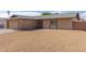 Single-story home with low-maintenance landscaping and an attached garage at 1002 W Villa Rita Dr, Phoenix, AZ 85023