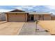 Charming front exterior with a garage, sidewalk, and low-maintenance landscaping at 1002 W Villa Rita Dr, Phoenix, AZ 85023