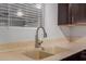 Kitchen sink featuring neutral countertop and faucet fixture at 1002 W Villa Rita Dr, Phoenix, AZ 85023