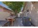 Outdoor patio with tables and chairs, AC unit, perfect for entertaining at 1226 E Greenway Cir, Mesa, AZ 85203