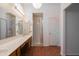 Spacious primary bathroom features dual sinks and a glass shower enclosure at 1226 E Greenway Cir, Mesa, AZ 85203