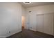 Neutral bedroom with closet and updated fan featuring plush carpeting at 1226 E Greenway Cir, Mesa, AZ 85203