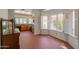 Sunlit kitchen featuring wood cabinets and a breakfast nook with bright windows at 1226 E Greenway Cir, Mesa, AZ 85203