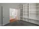 A home office with built-in shelving at 1226 E Greenway Cir, Mesa, AZ 85203