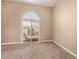 Bedroom with plush carpeting and a sliding glass door for natural light at 1367 S Country Club Dr # 1299, Mesa, AZ 85210