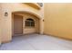 Inviting covered entryway with arched detail, enhancing curb appeal and a welcoming entrance at 1367 S Country Club Dr # 1299, Mesa, AZ 85210
