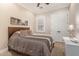 Cozy bedroom with carpet, art, window, and a comfortable bed, offering a relaxing space at 1508 N Alta Mesa Dr # 120, Mesa, AZ 85205