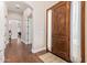 Bright entryway with wood floors and view to other living spaces at 1508 N Alta Mesa Dr # 120, Mesa, AZ 85205