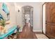 Charming entryway featuring wood floors and stylish decor at 1508 N Alta Mesa Dr # 120, Mesa, AZ 85205