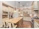 Granite counters complement stainless appliances and wood cabinets in this kitchen at 1508 N Alta Mesa Dr # 120, Mesa, AZ 85205