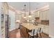 Spacious kitchen with granite countertops, wooden island and stainless steel appliances at 1508 N Alta Mesa Dr # 120, Mesa, AZ 85205