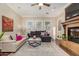 Inviting living room with fireplace, hardwood flooring, and comfortable seating at 1508 N Alta Mesa Dr # 120, Mesa, AZ 85205