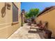 Outdoor patio featuring a built-in kitchen, dining set, and lounge chairs for relaxation at 1508 N Alta Mesa Dr # 120, Mesa, AZ 85205