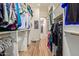 The walk-in closet has custom shelving for organized storage, and features a wood floor at 1508 N Alta Mesa Dr # 120, Mesa, AZ 85205