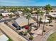 Backyard view featuring lush desert landscaping with mountain views in a golf community at 15371 W Piccadilly Rd, Goodyear, AZ 85395